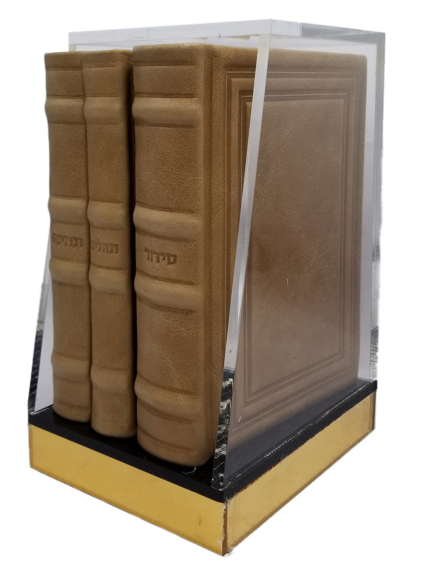Another angle of the Lehavanah three-volume set, antique leather in Antique Border Parchment