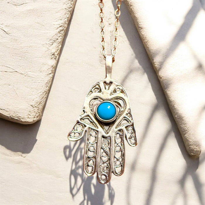 Turquoise stone hamsa hand pendant on a long sterling silver chain | Judaica Square Lakewood