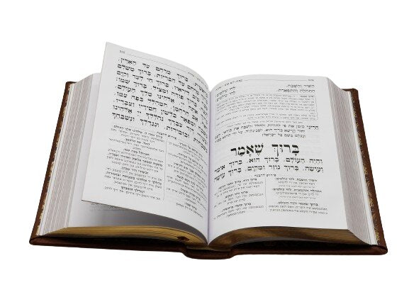 Open pages of the Korban Mincha siddur, medium, wave Swiss, showing the Hebrew text layout
