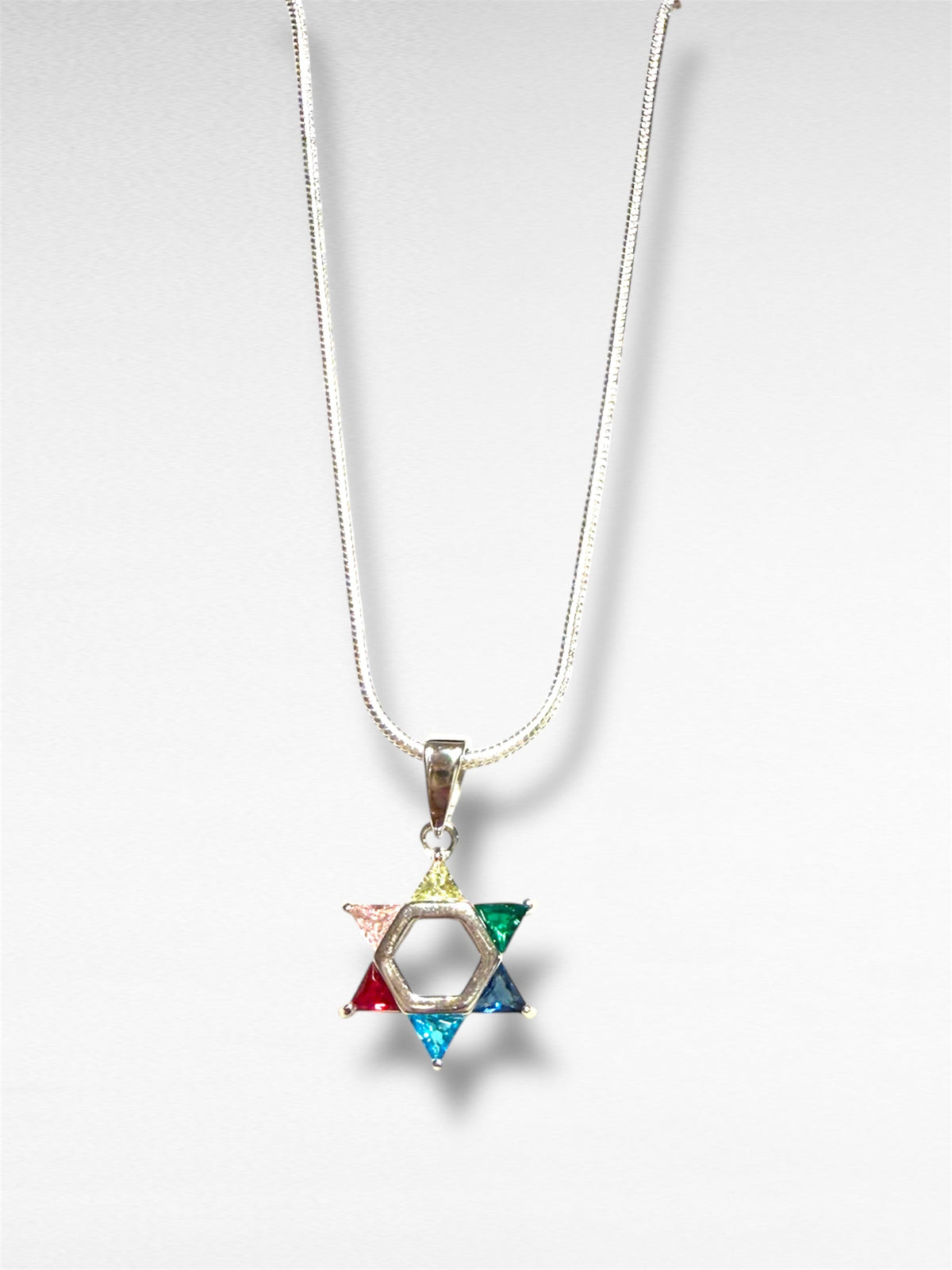 Petite sterling Star of David pendant set with rainbow gemstones