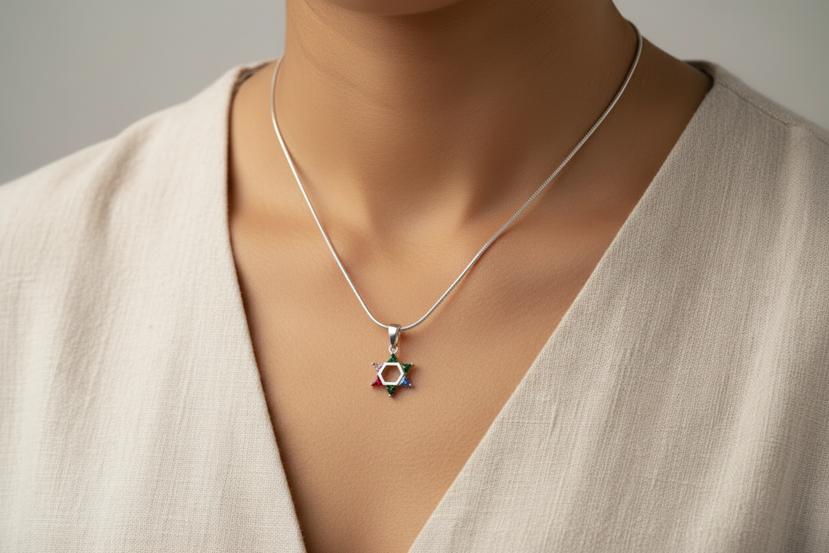 Petite sterling Star of David pendant set with rainbow gemstones
