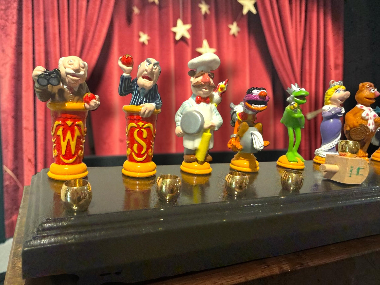 Muppets cast menorah — nine repurposed Muppets figures along a long plaque with brass cups | Judaica Square Lakewood (view 4)