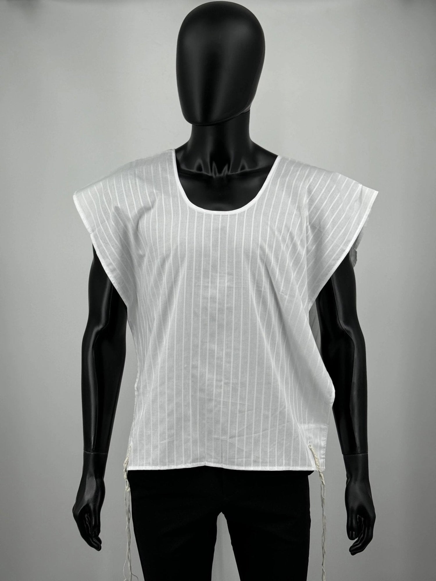 Men's white cotton tallit katan on mannequin with V-neck and stripes
