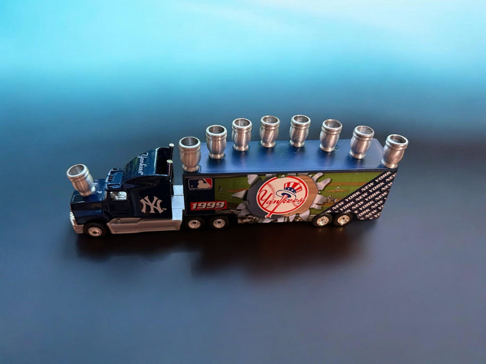 Yankees truck menorah — vintage die-cast baseball truck with a row of aluminum candle cups | Judaica Square Lakewood
