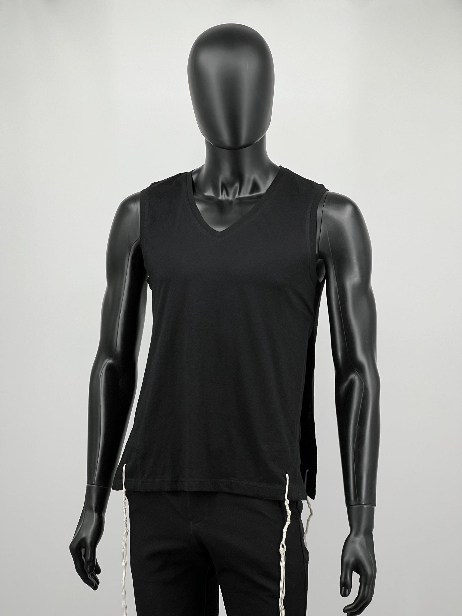 Black sleeveless cotton tzitzit tank top on mannequin, full view