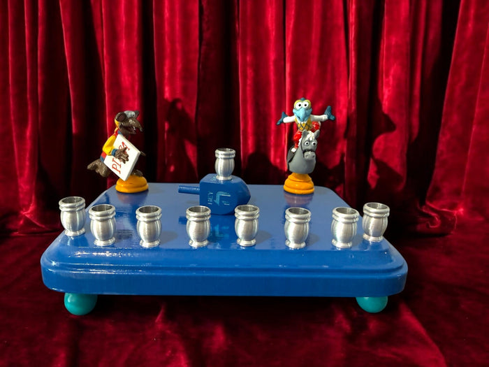 Gonzo and Ralph menorah — two Muppets chess figures sharing a painted wood plaque | Judaica Square Lakewood