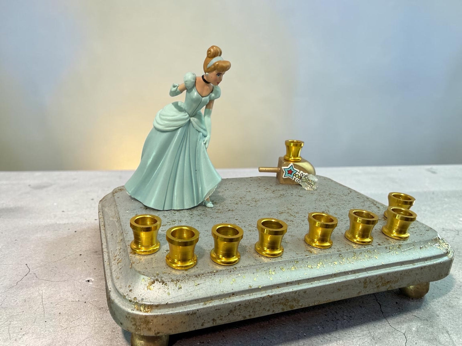 Cinderella menorah — Disney princess figurine on silver base with nine gold cups | Judaica Square Lakewood (view 9)