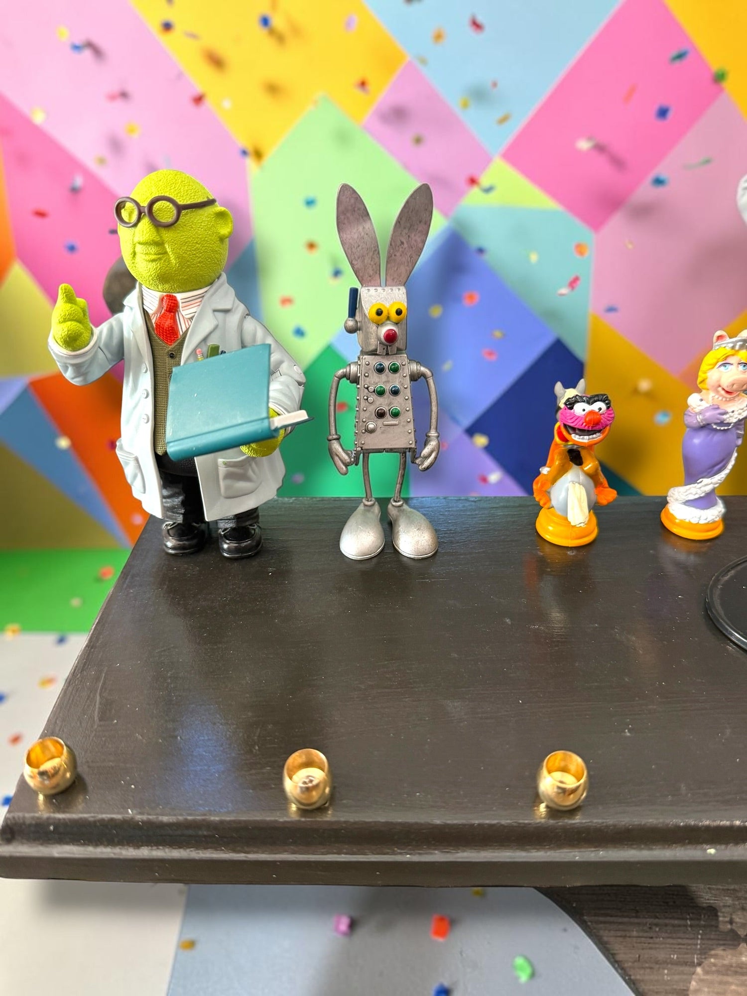 Muppets cast menorah — nine repurposed Muppets figures along a long plaque with brass cups | Judaica Square Lakewoo (view 11)