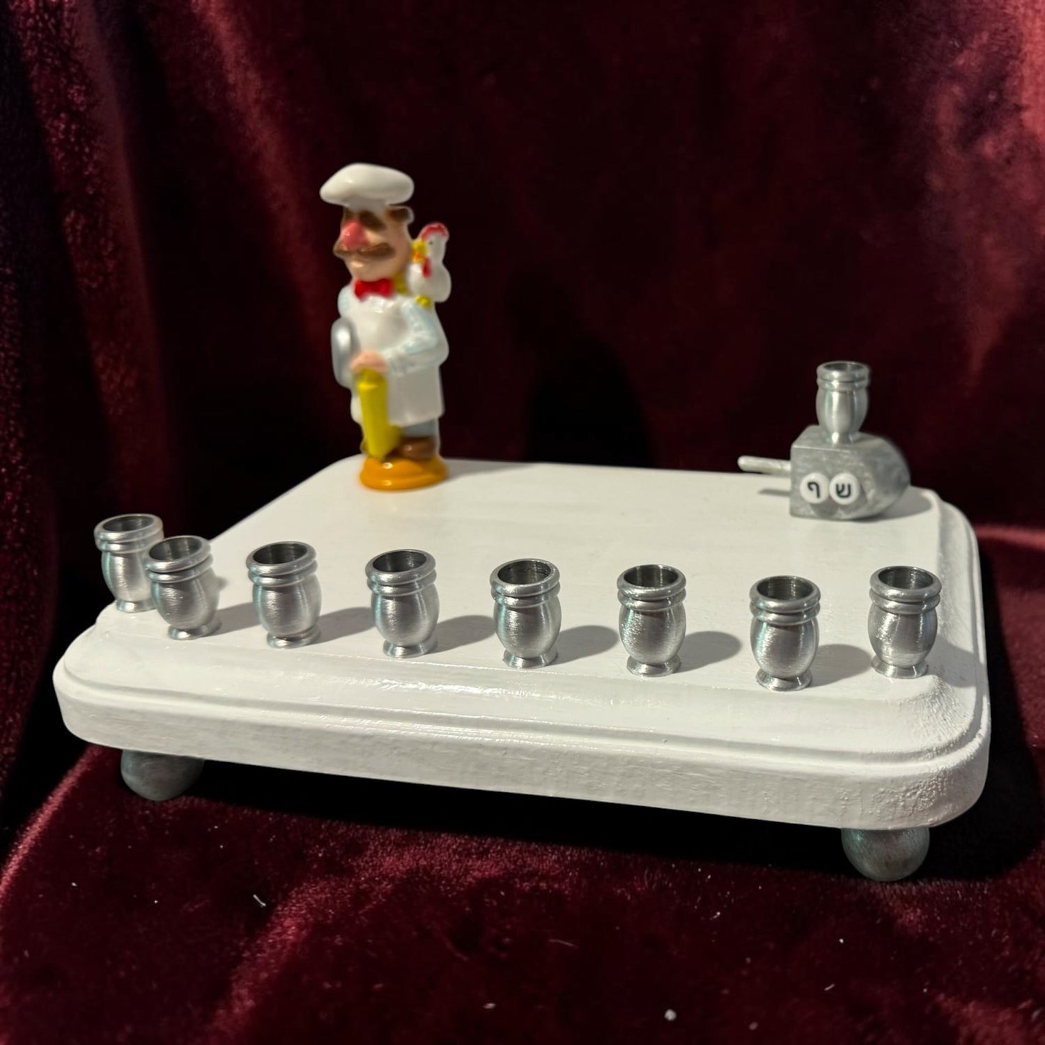 Swedish Chef menorah — Muppets chef figure with Hebrew bead dreidel and aluminum cups | Judaica Square Lakewood (view 3)