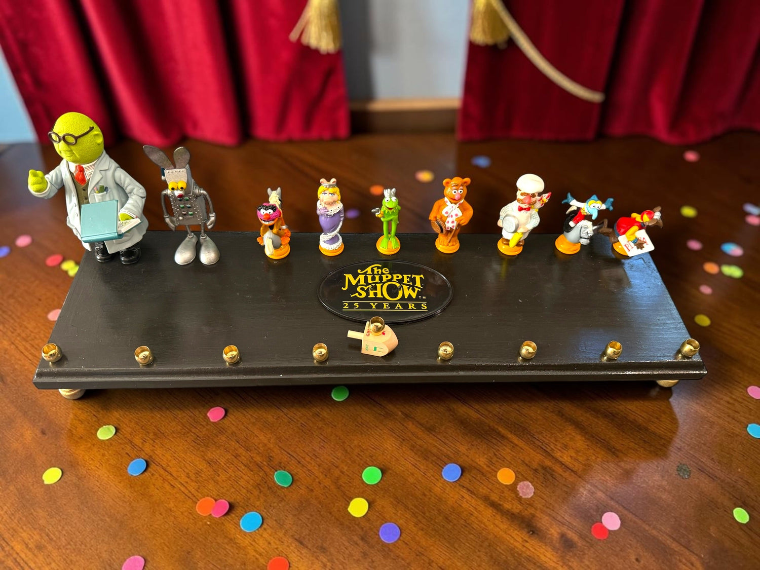 Muppets cast menorah — nine repurposed Muppets figures along a long plaque with brass cups | Judaica Square Lakewood (view 7)