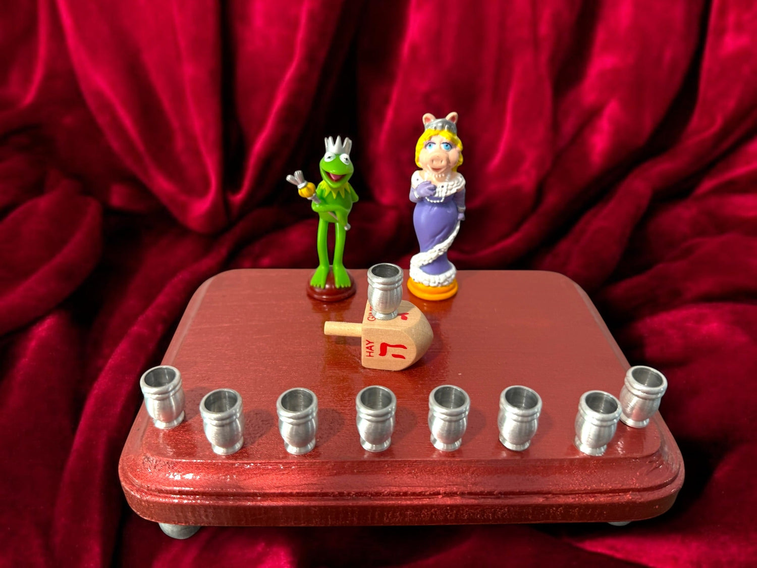 Kermit and Miss Piggy menorah — Muppets chess figures on a small painted plaque | Judaica Square Lakewood (view 5)