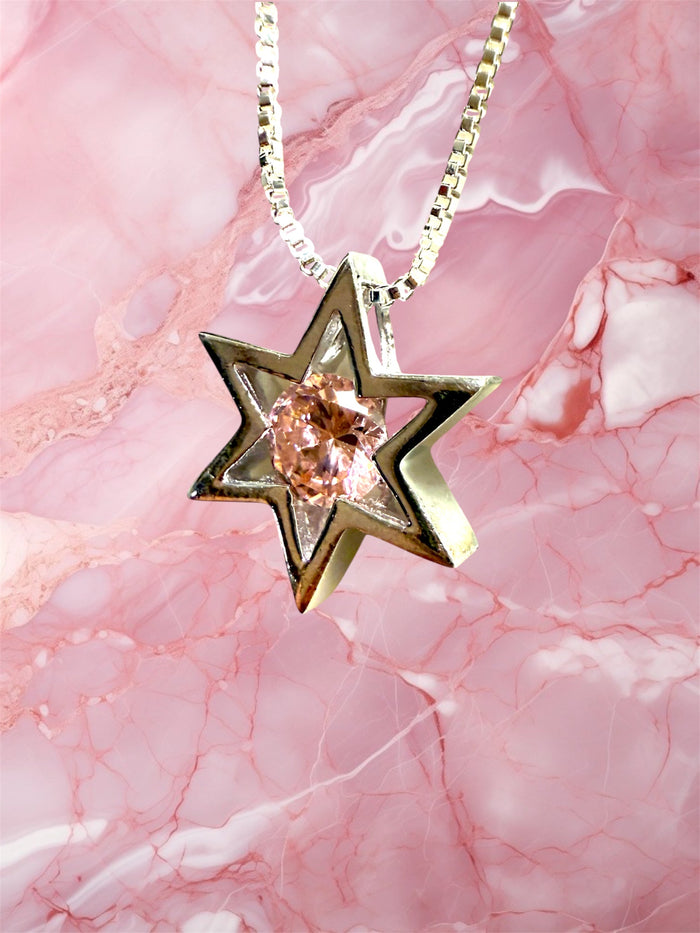 Modern sterling Star of David pendant centered with a pink stone | Judaica Square Lakewood