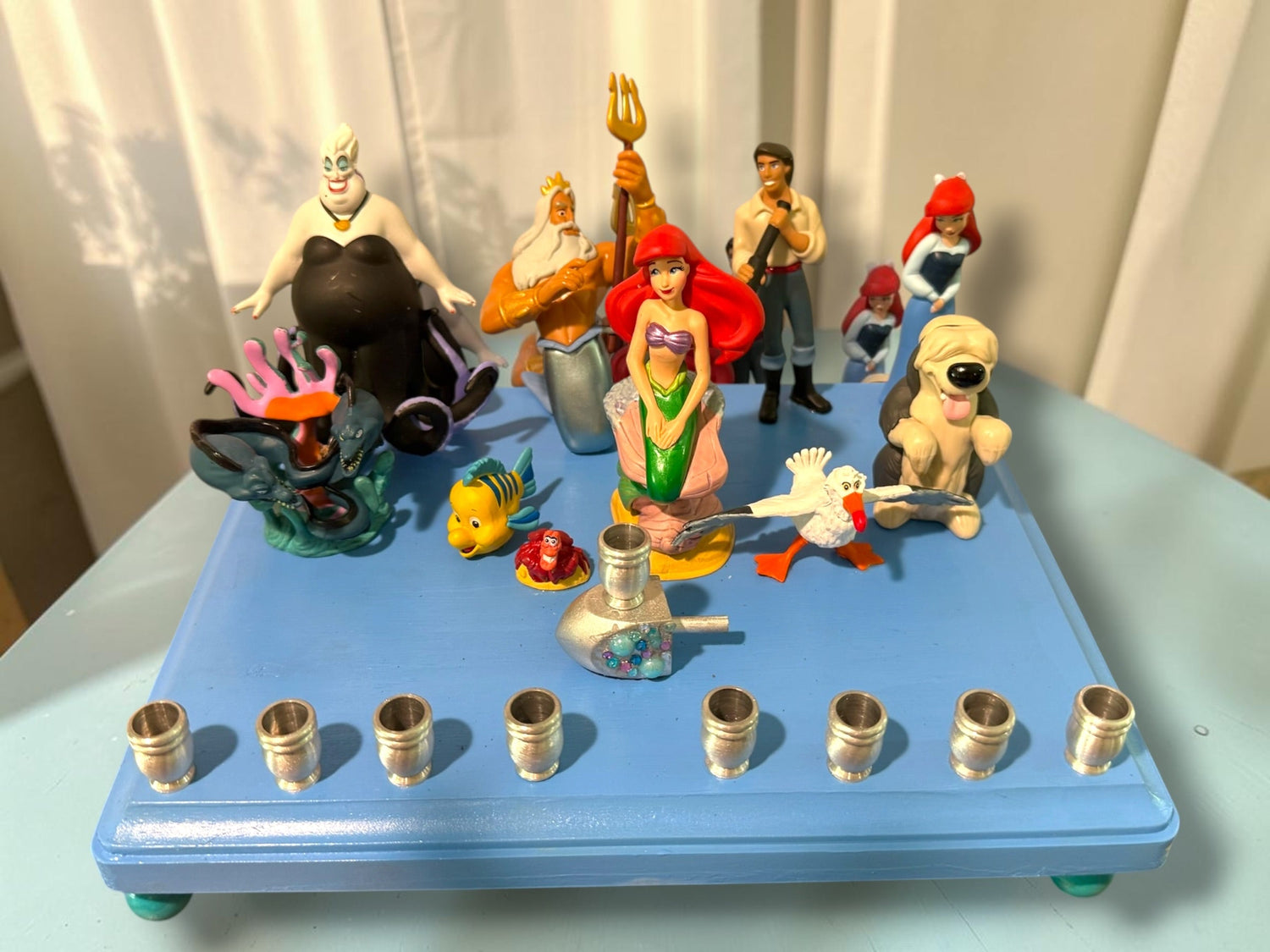 Little Mermaid Menorah — mermaid figures and rhinestones on a painted wood plaque | Judaica Square Lakewood (view 19)