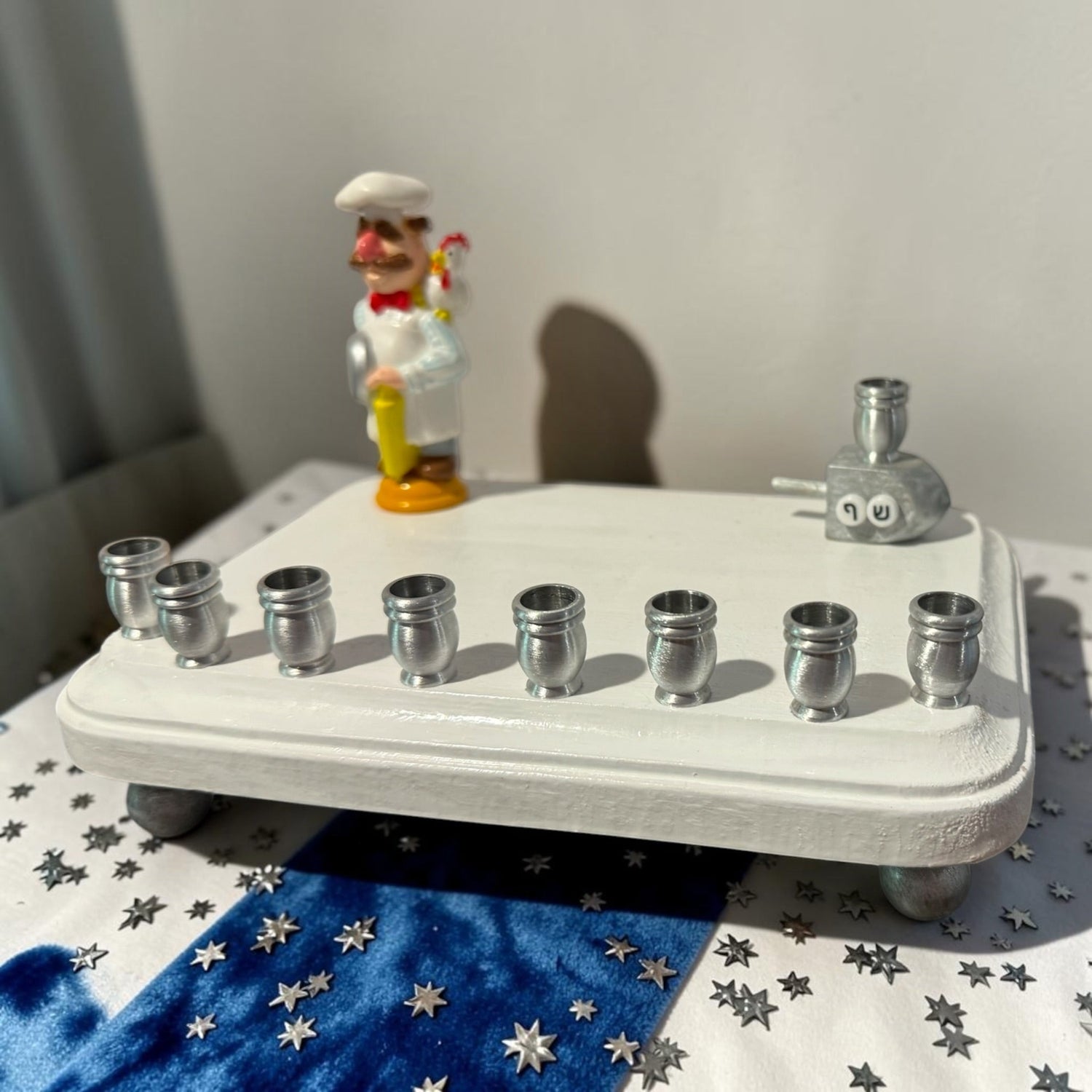 Swedish Chef menorah — Muppets chef figure with Hebrew bead dreidel and aluminum cups | Judaica Square Lakewood (view 9)