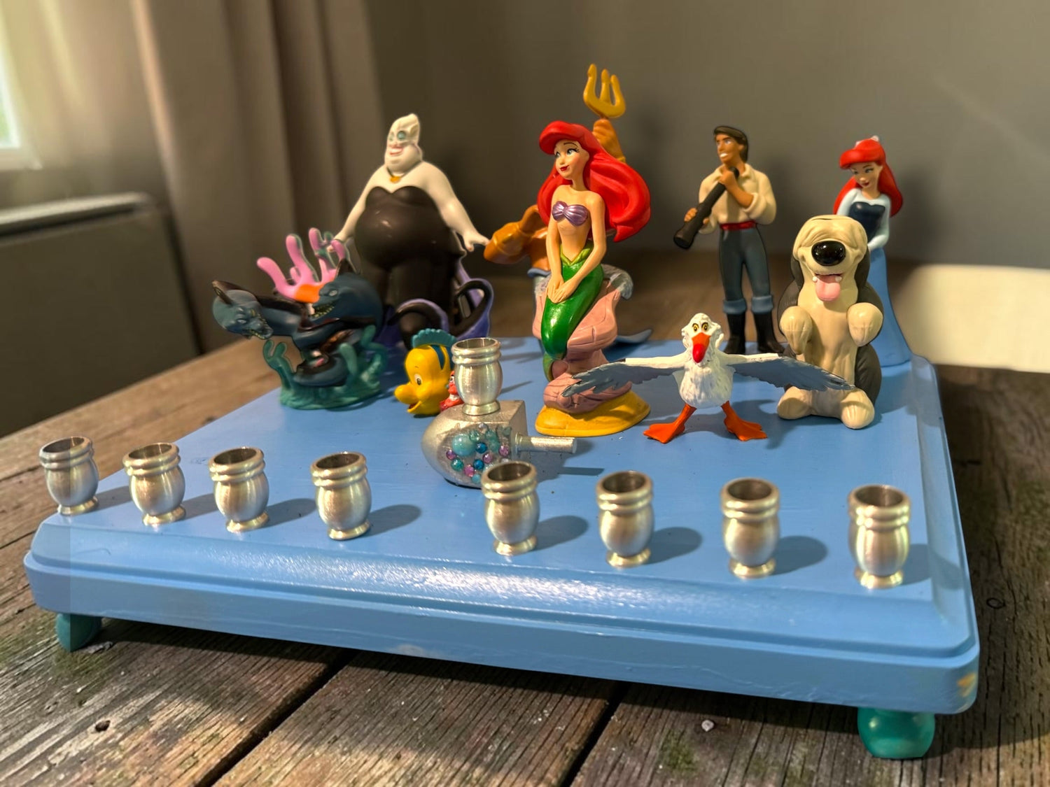 Little Mermaid Menorah — mermaid figures and rhinestones on a painted wood plaque | Judaica Square Lakewood (view 13)