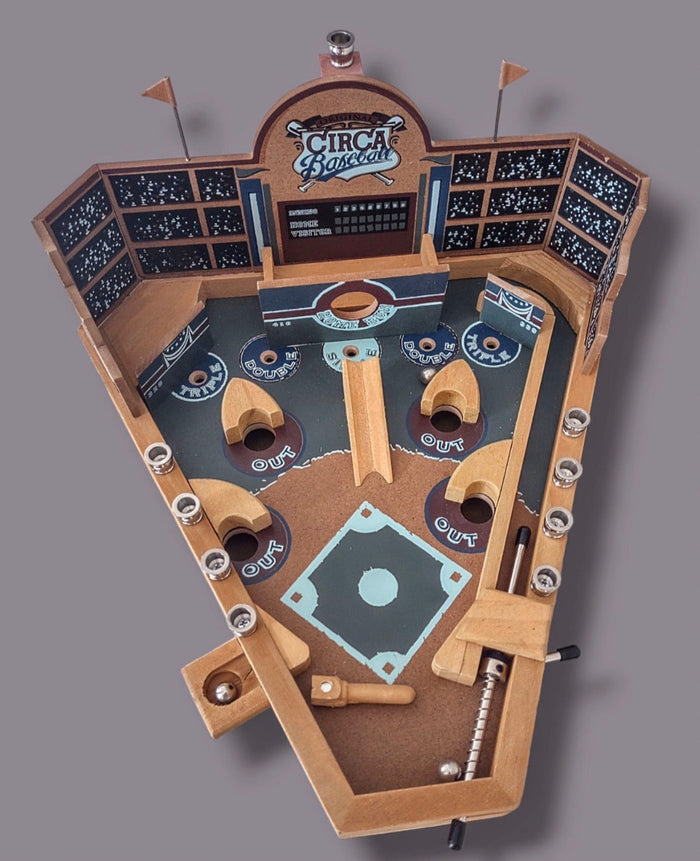 Pinball machine menorah — vintage game body with brass candle cups and silver marbles | Judaica Square Lakewood
