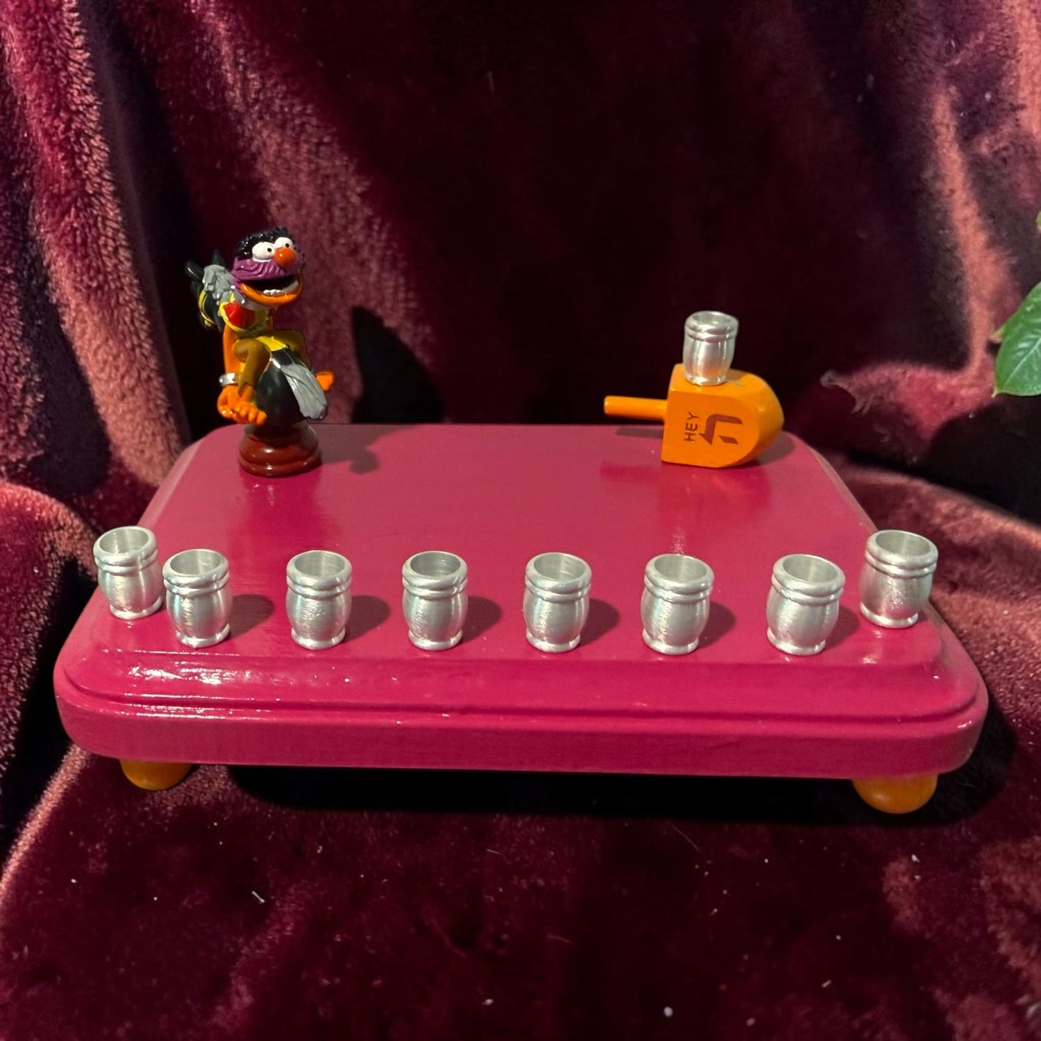Animal Muppets menorah — wild-haired drummer chess figure above aluminum candle cups | Judaica Square Lakewood (view 14)