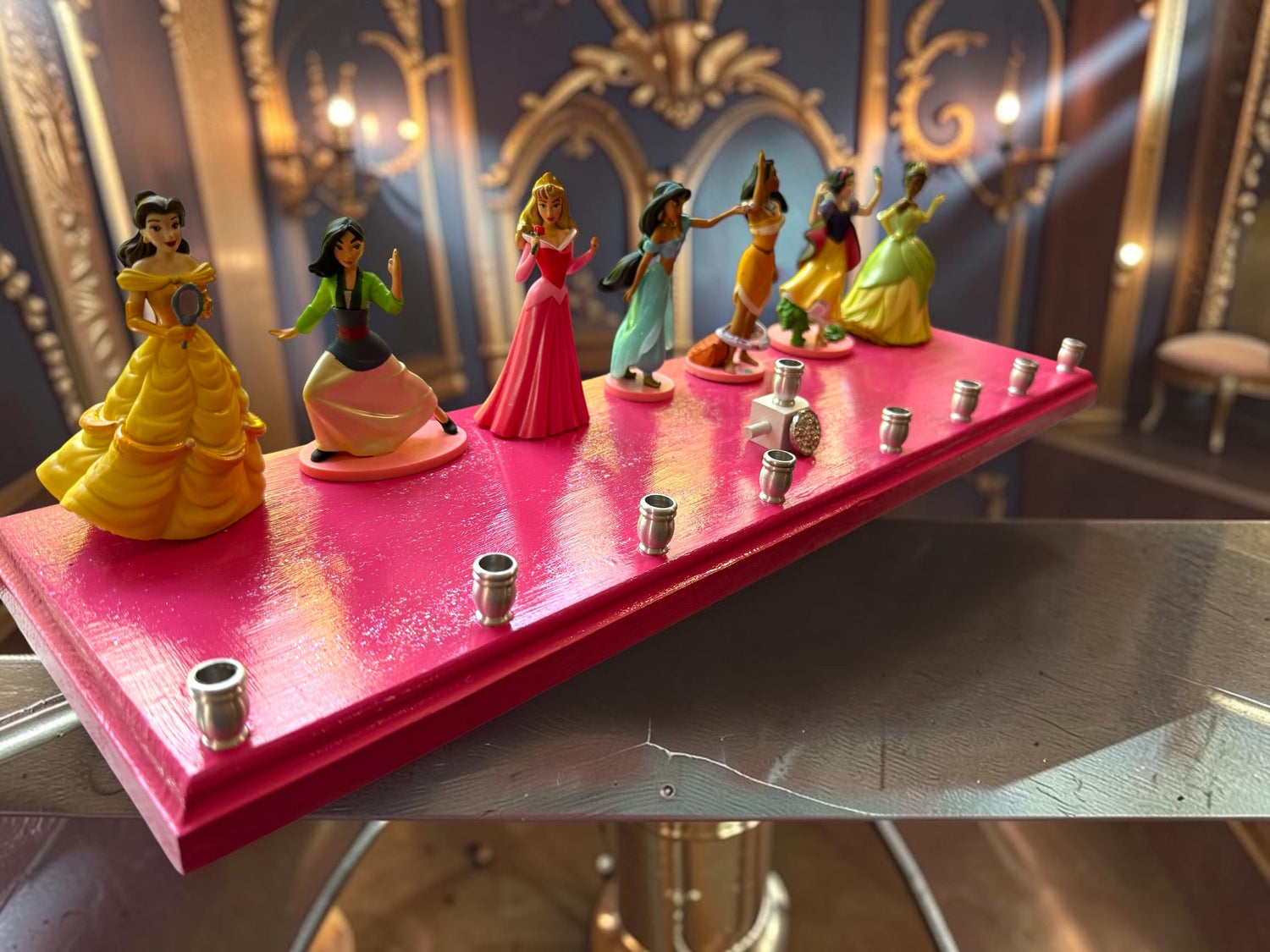 Classic Disney princess menorah — row of repurposed princess figures on pink glitter plaque | Judaica Square Lakewoo (view 3)