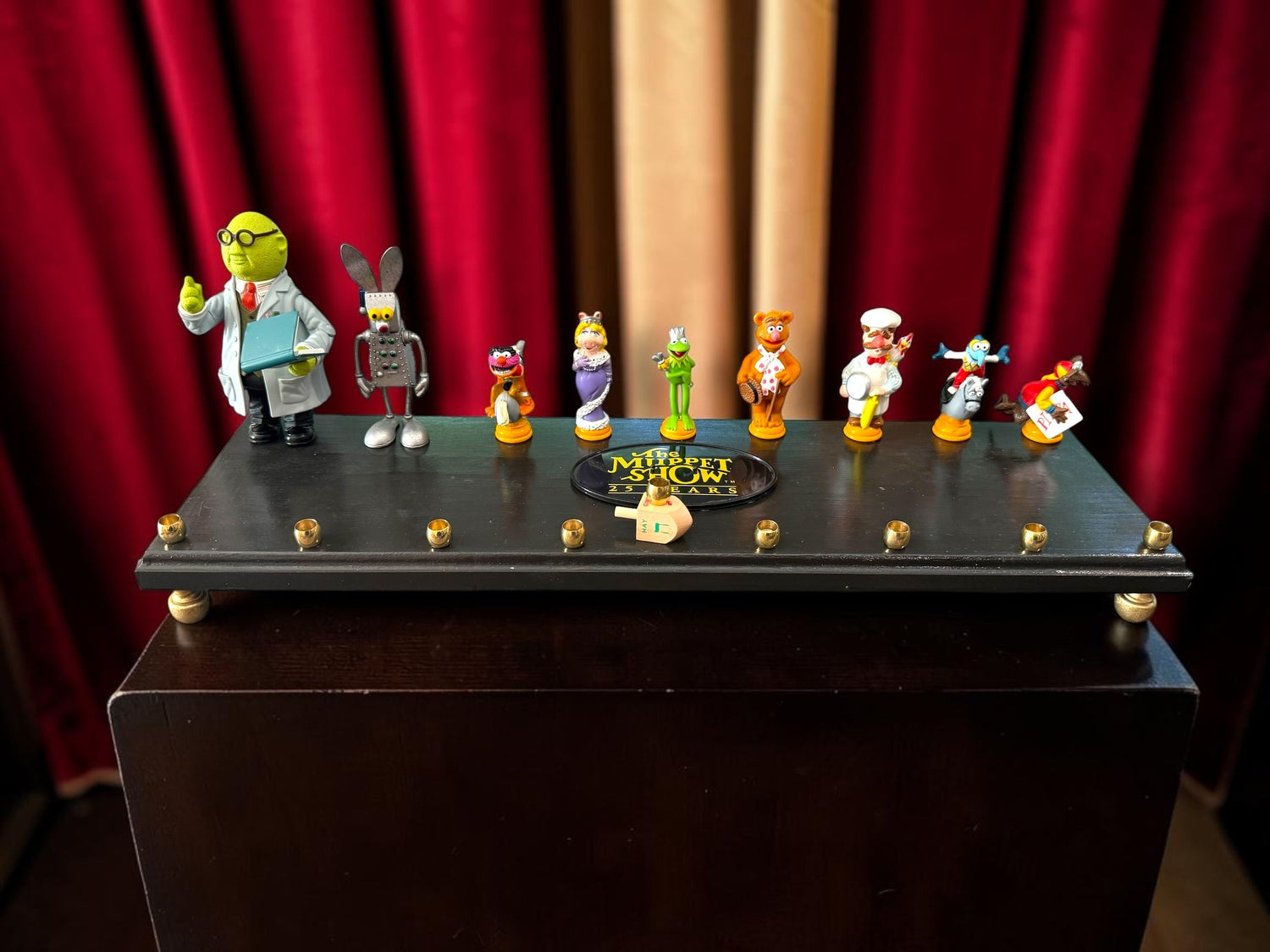 Muppets cast menorah — nine repurposed Muppets figures along a long plaque with brass cups | Judaica Square Lakewood (view 6)
