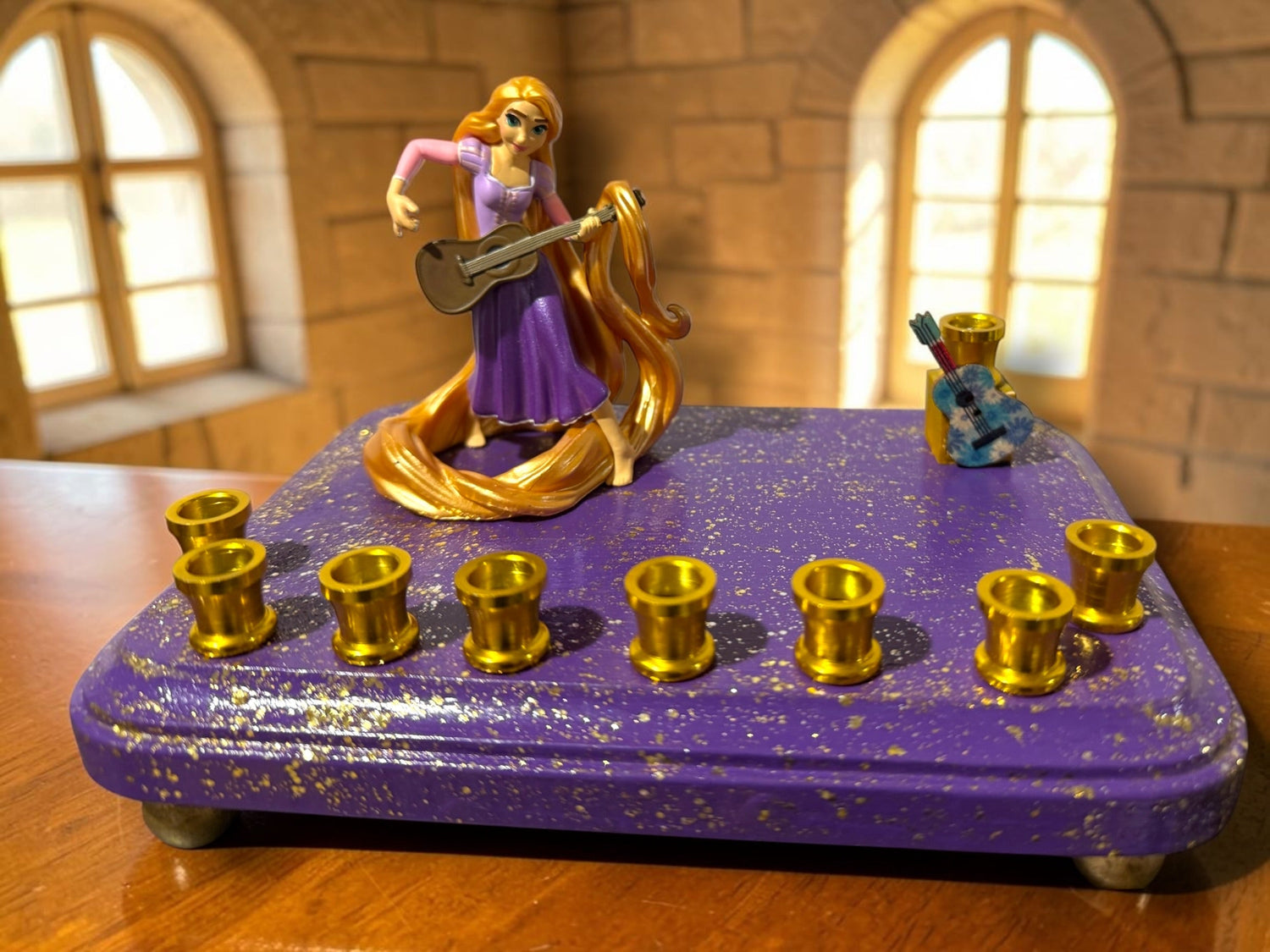 Rapunzel menorah — Tangled figure with wooden guitar shamash on painted base | Judaica Square Lakewood (view 3)