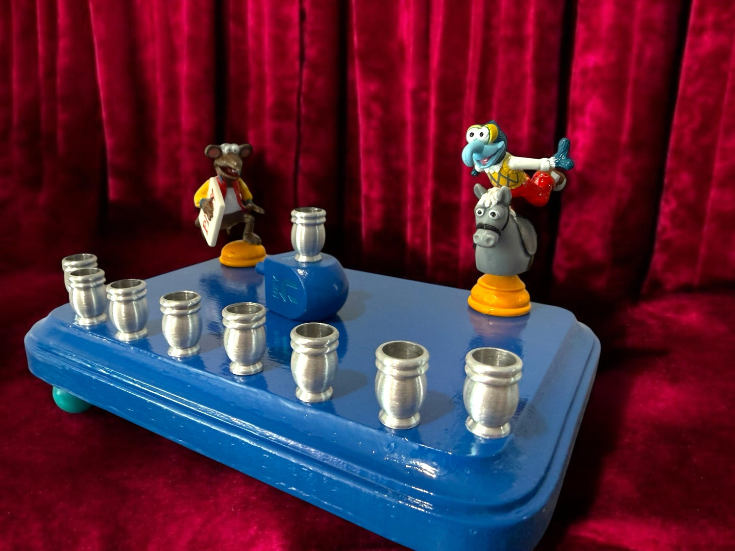 Gonzo and Ralph menorah — two Muppets chess figures sharing a painted wood plaque | Judaica Square Lakewood (view 7)
