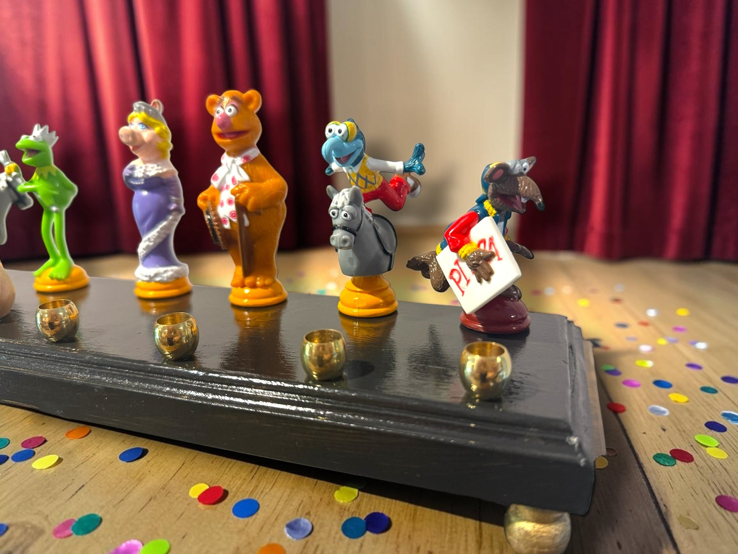Muppets cast menorah — nine repurposed Muppets figures along a long plaque with brass cups | Judaica Square Lakewood (view 5)