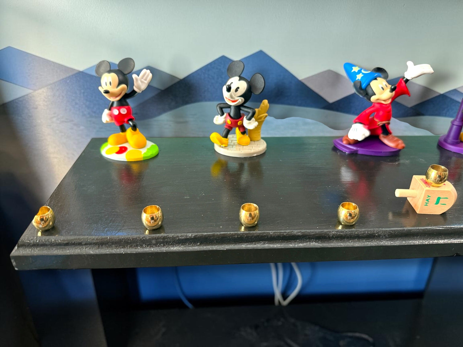 Mickey Mouse anniversary menorah — row of repurposed Disney figures with brass cups | Judaica Square Lakewood (view 5)