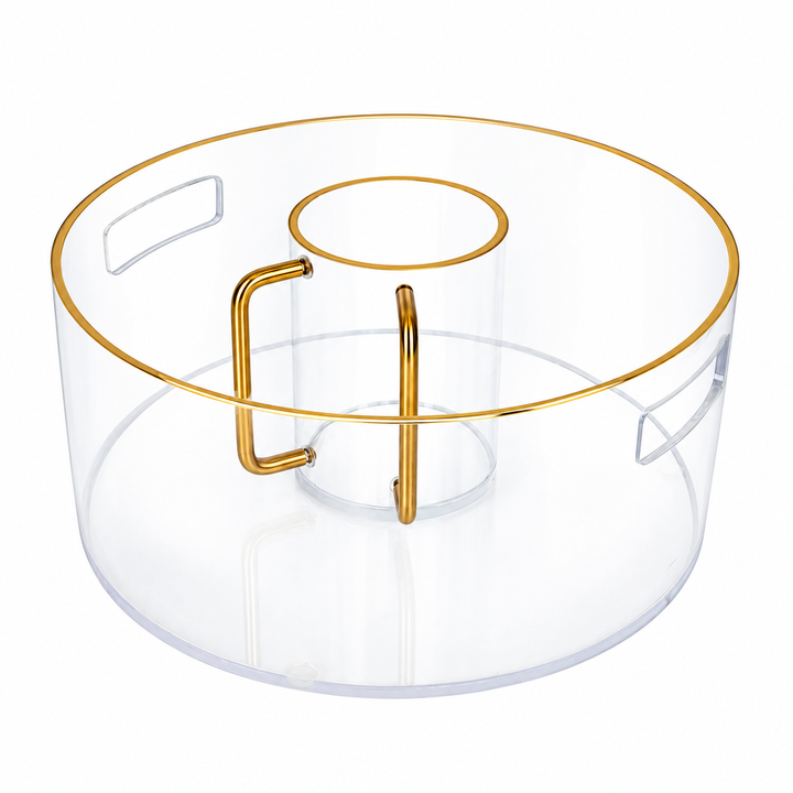 Clear acrylic wash cup with two gold-tone handles inside a matching bowl with gold-tone trim