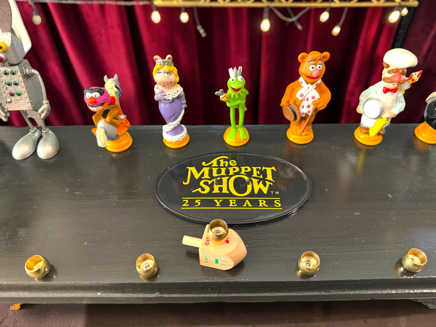 Muppets cast menorah — nine repurposed Muppets figures along a long plaque with brass cups | Judaica Square Lakewoo (view 12)