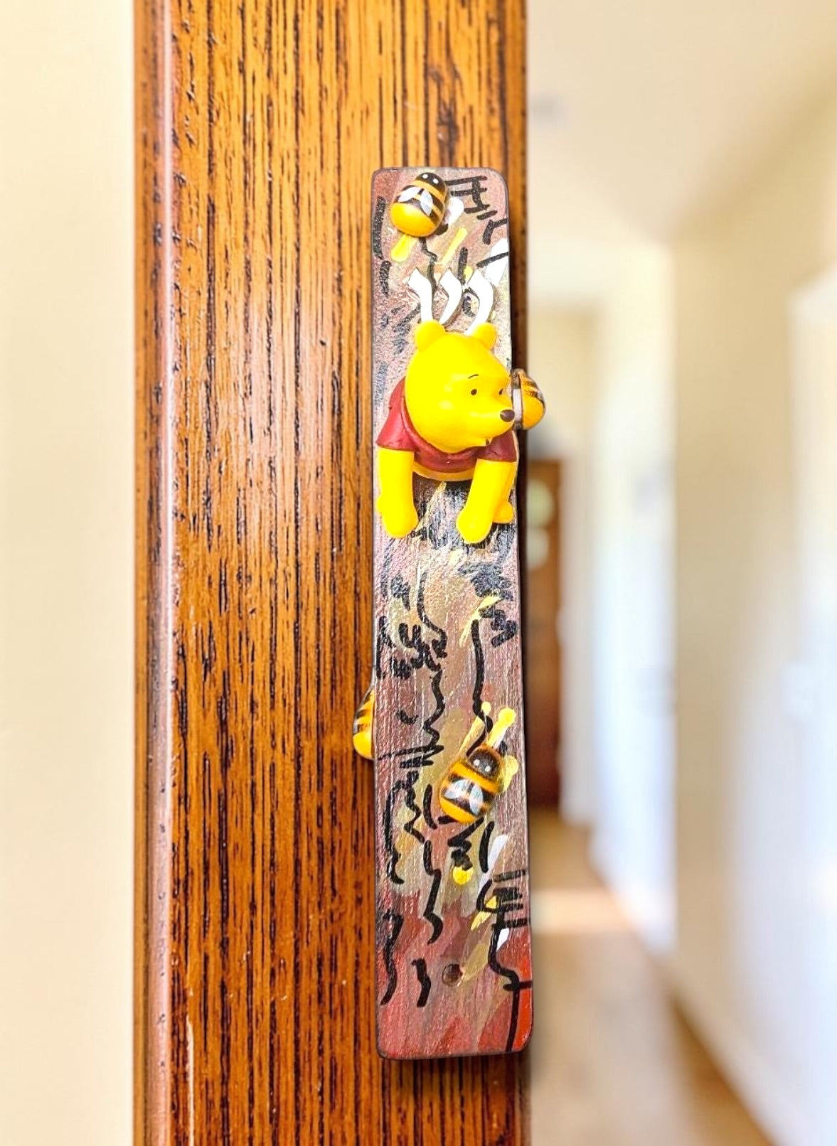 Winnie the Pooh mezuzah — bear and wooden bees on painted tree | Judaica Square Lakewood (view 4)