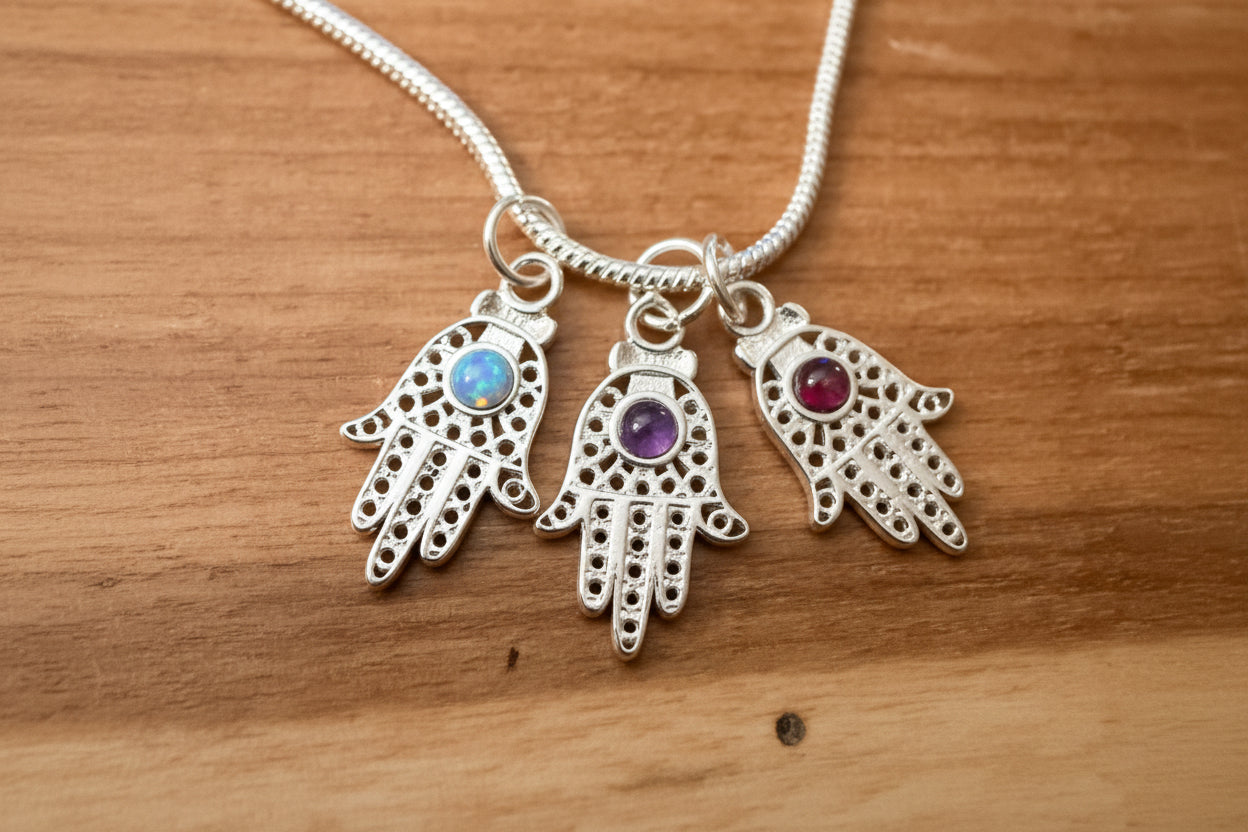 Filigree sterling hamsa pendant set with a purple amethyst stone | Judaica Square Lakewood (view 2)