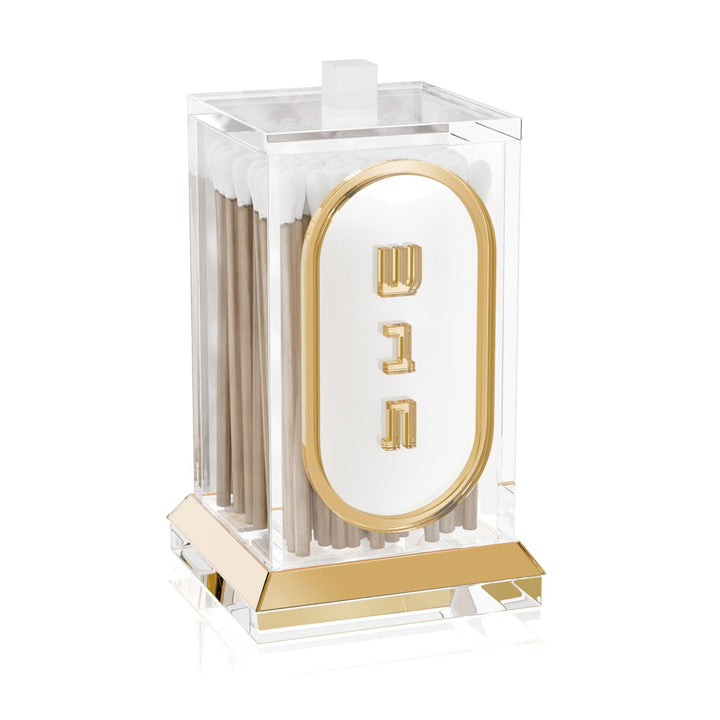 Lucent match holder in gold, clear lucite box of matches with Shabbos lettering in a gold oval