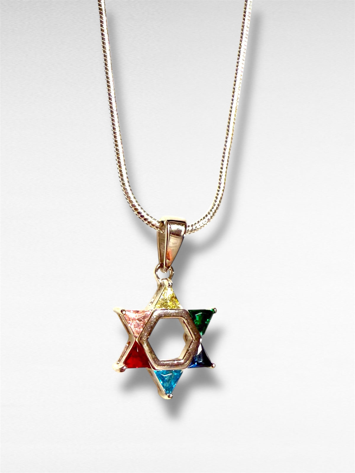 Petite sterling Star of David pendant set with rainbow gemstones