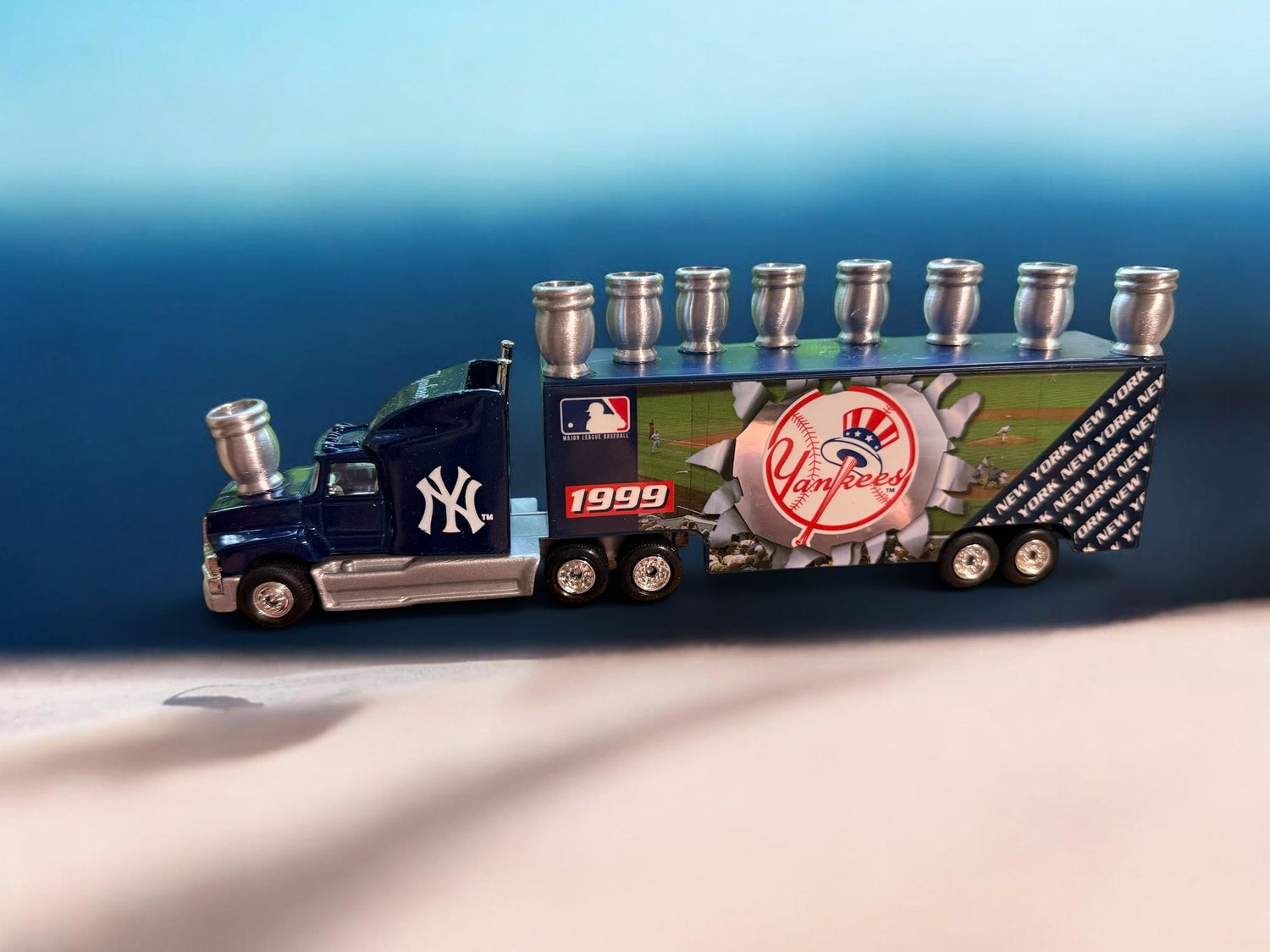 Yankees truck menorah — vintage die-cast baseball truck with a row of aluminum candle cups | Judaica Square Lakewood (view 9)