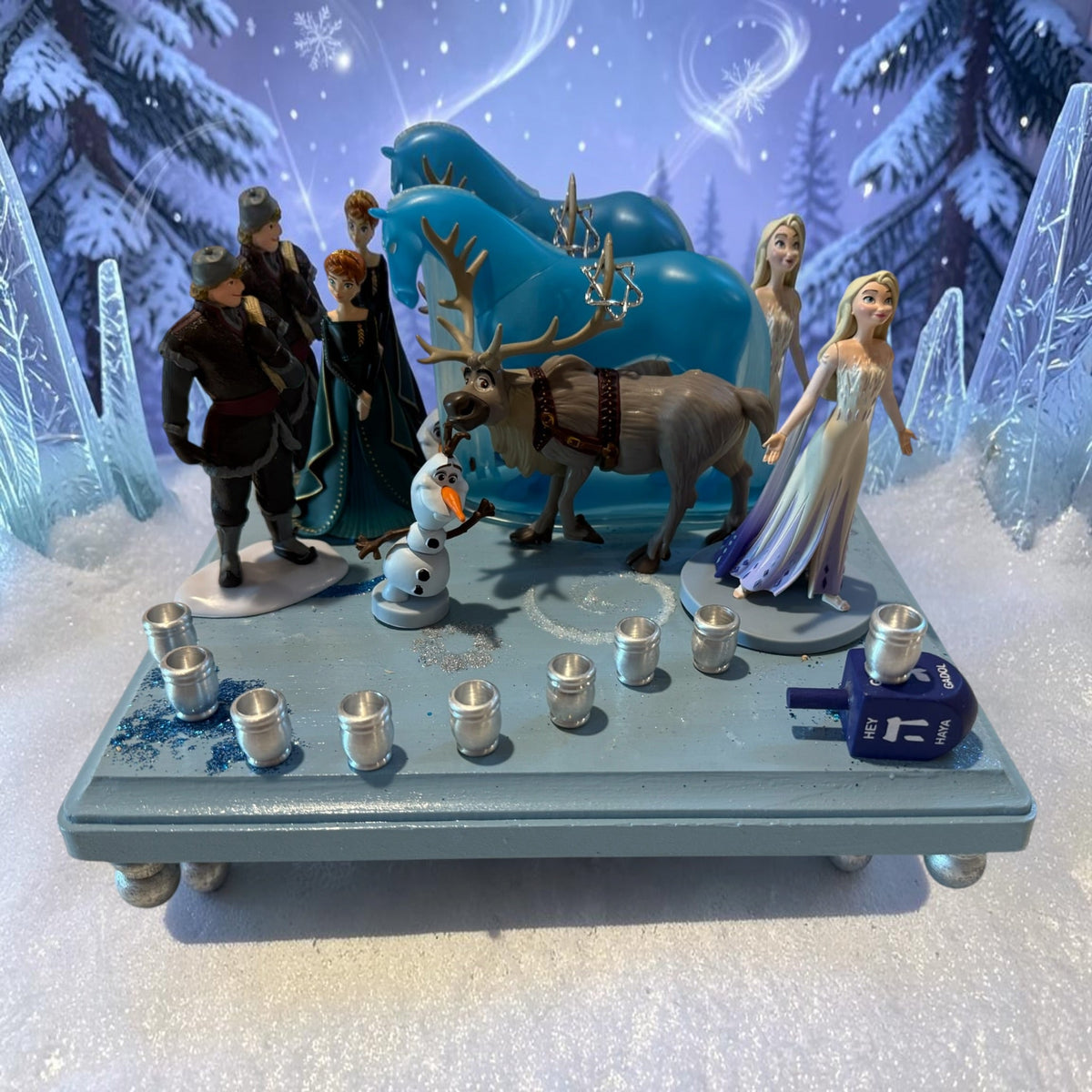 Frozen Menorah — Anna and Elsa figures with glitter dreidel shamash | Judaica Square Lakewood (view 2)