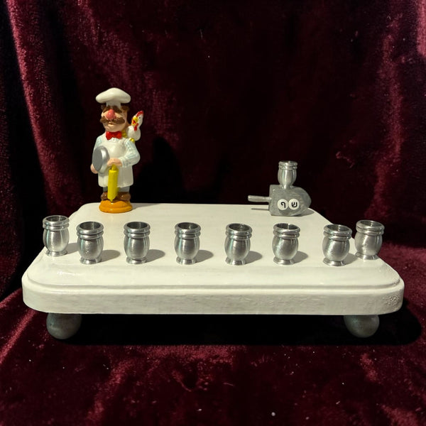 Swedish Chef menorah — Muppets chef figure with Hebrew bead dreidel and aluminum cups | Judaica Square Lakewood