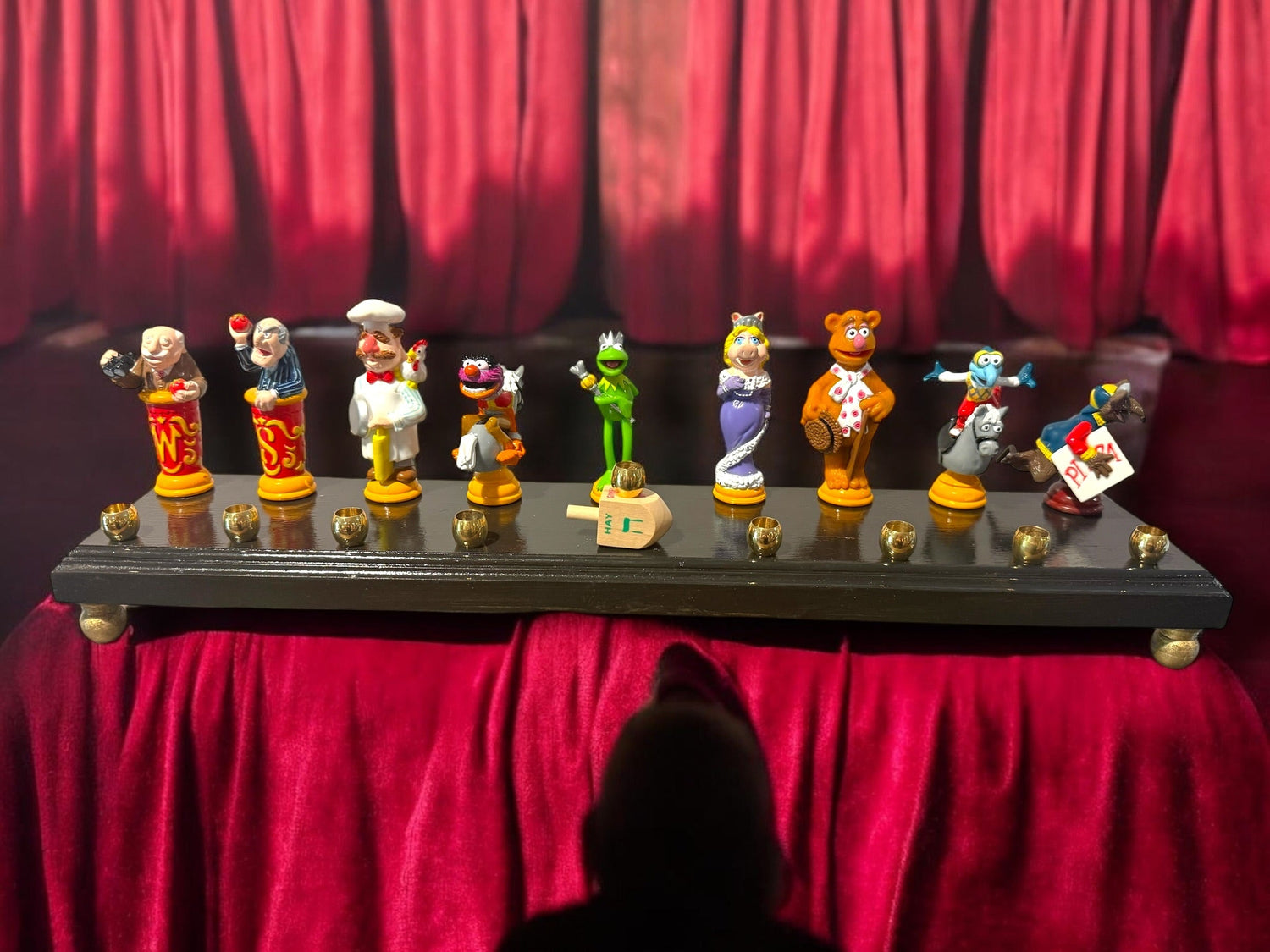 Muppets cast menorah — nine repurposed Muppets figures along a long plaque with brass cups | Judaica Square Lakewoo (view 22)