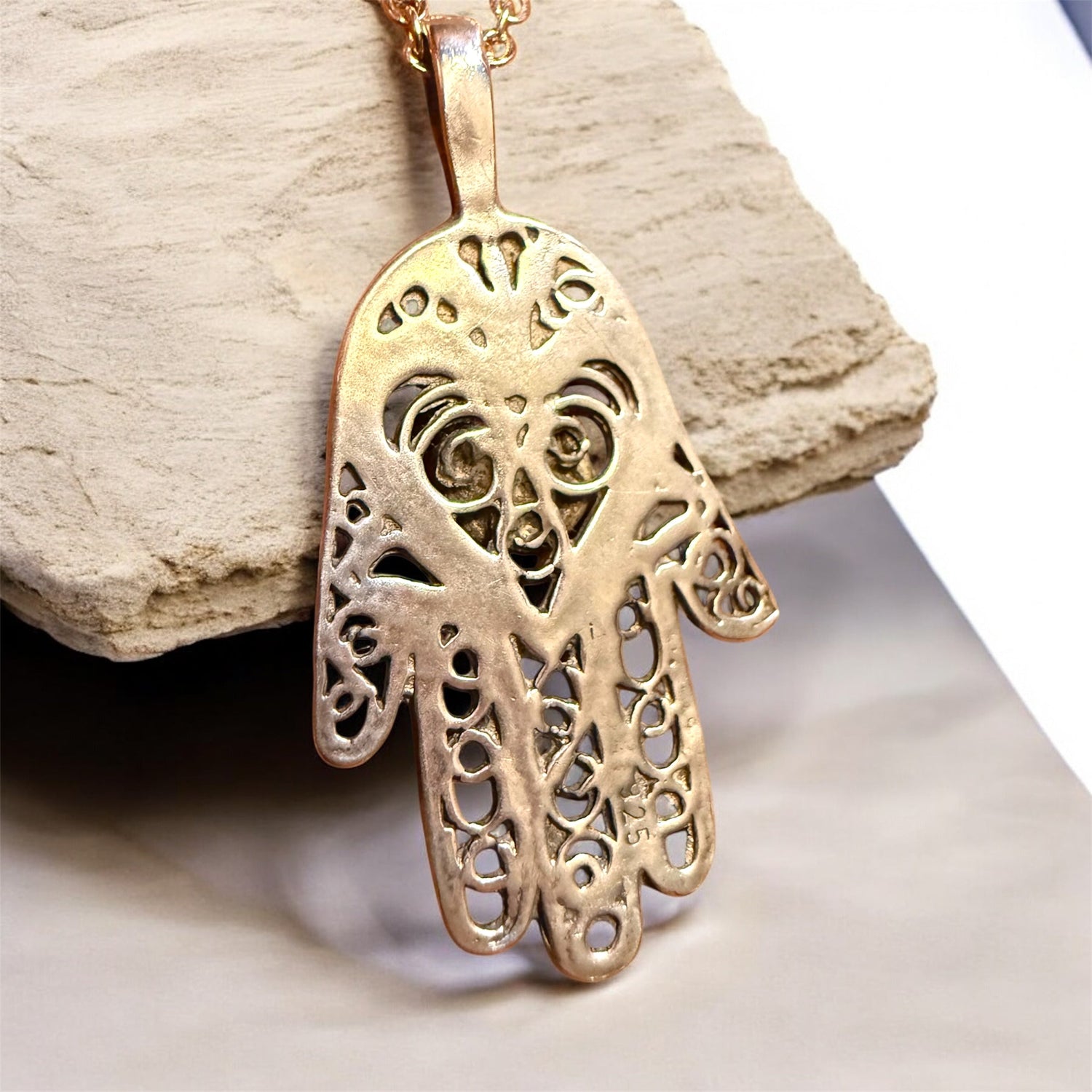 Turquoise stone hamsa hand pendant on a long sterling silver chain | Judaica Square Lakewood (view 3)