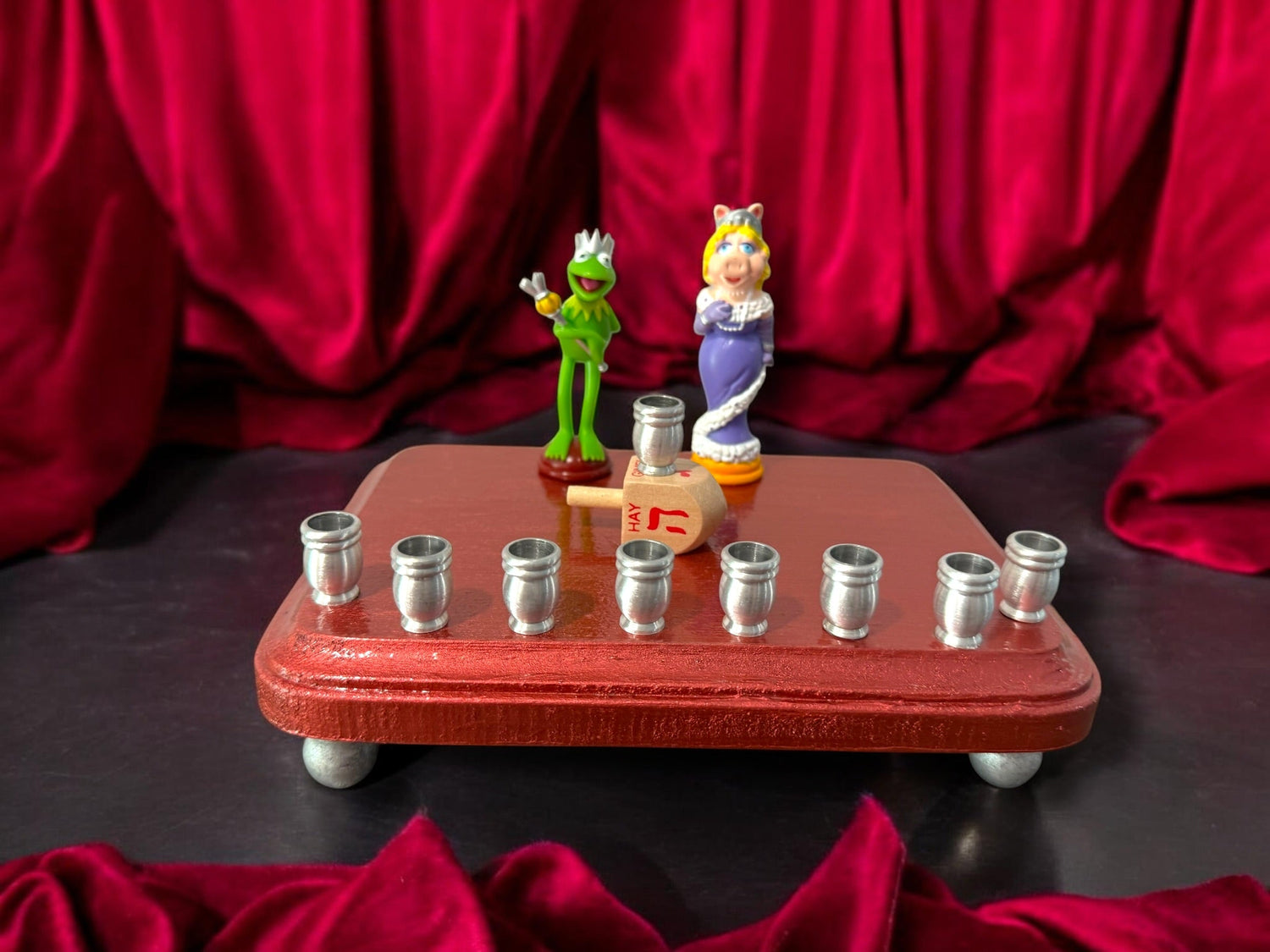 Kermit and Miss Piggy menorah — Muppets chess figures on a small painted plaque | Judaica Square Lakewood (view 4)
