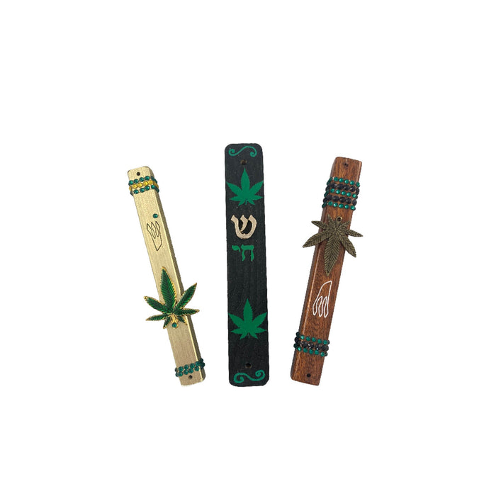 Cannabis mezuzah case — gold enamel leaf and rhinestones on painted pine and steel cases | Judaica Square Lakewood