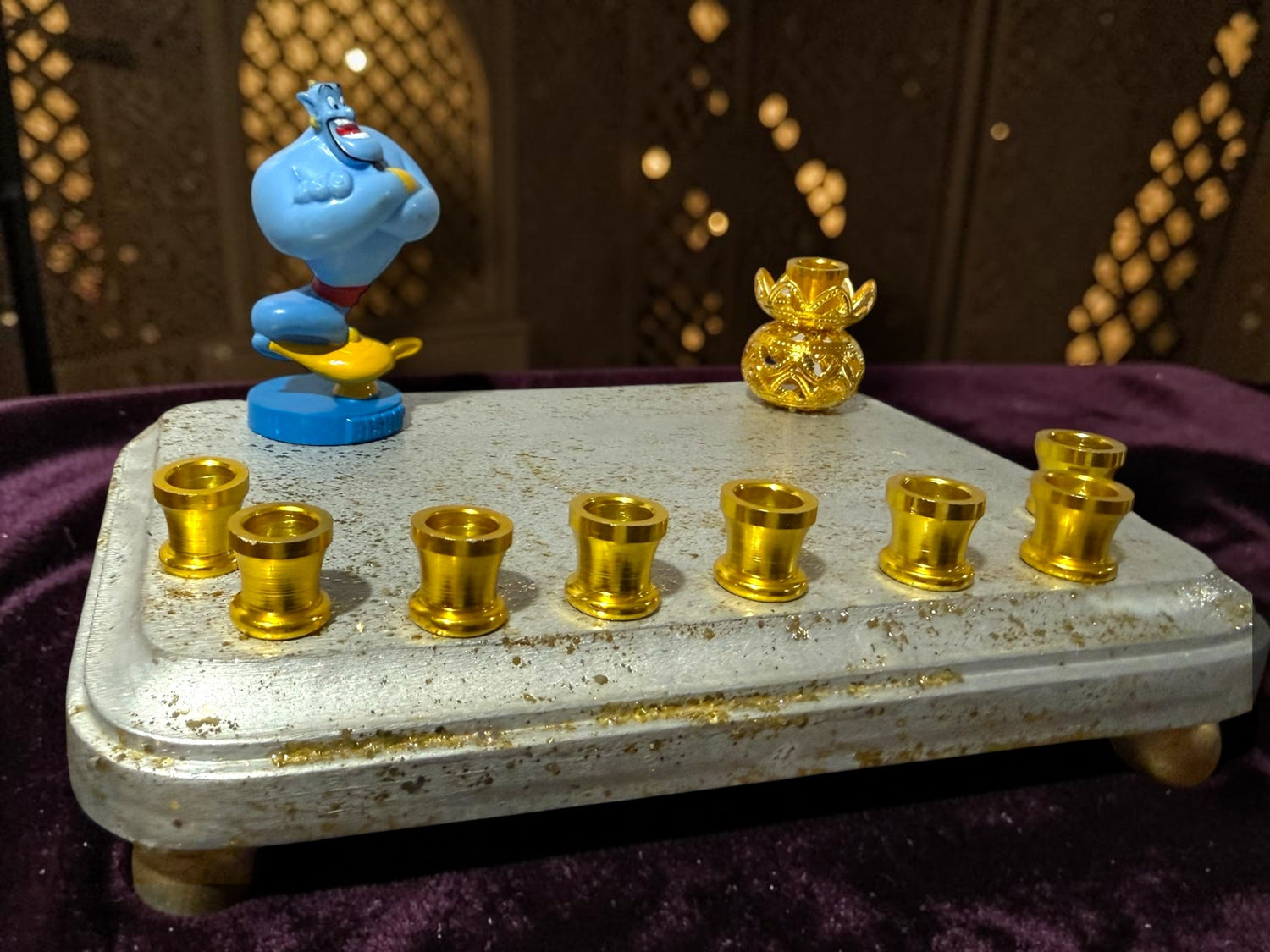 Genie menorah — blue Aladdin genie figure on painted wood plaque with aluminum candle cups | Judaica Square Lakewood (view 2)