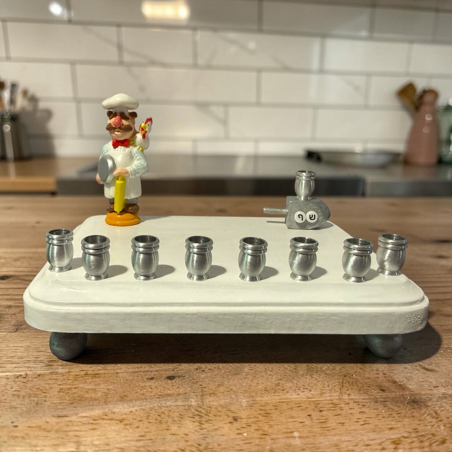 Swedish Chef menorah — Muppets chef figure with Hebrew bead dreidel and aluminum cups | Judaica Square Lakewood (view 6)