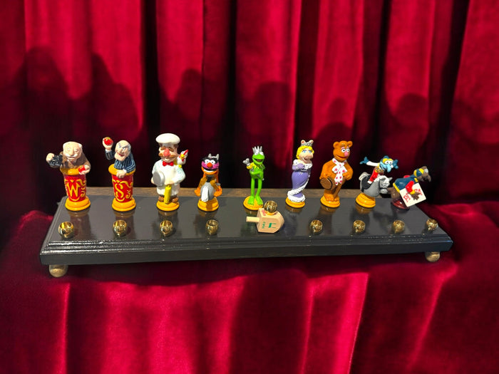Muppets cast menorah — nine repurposed Muppets figures along a long plaque with brass cups | Judaica Square Lakewood