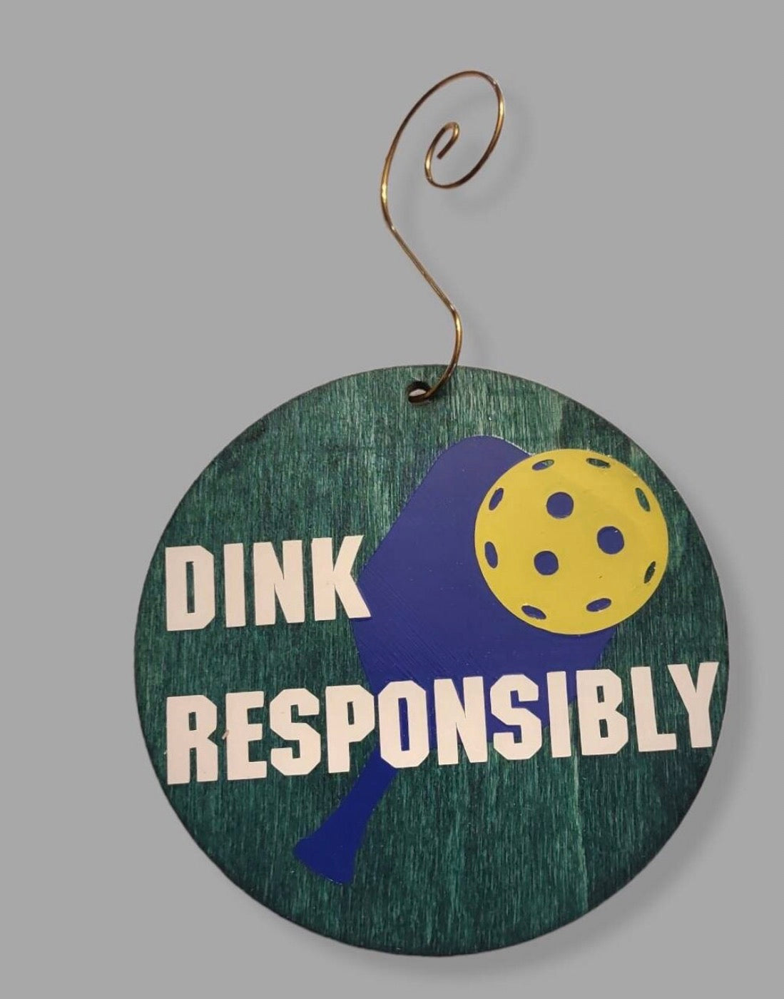 Pickleball ornament — green-stained wood circle with white pickleball decal and hook | Judaica Square Lakewood (view 6)