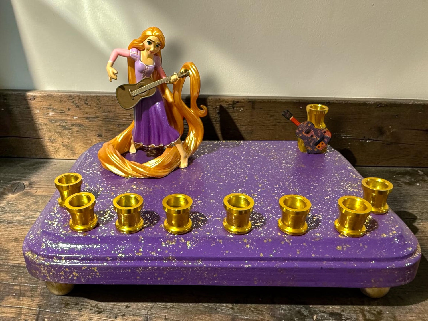 Rapunzel menorah — Tangled figure with wooden guitar shamash on painted base | Judaica Square Lakewood (view 8)