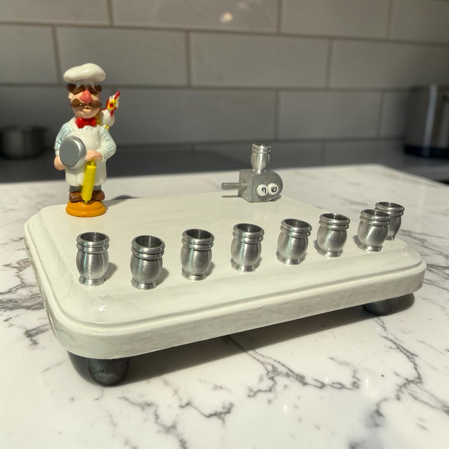Swedish Chef menorah — Muppets chef figure with Hebrew bead dreidel and aluminum cups | Judaica Square Lakewood (view 12)