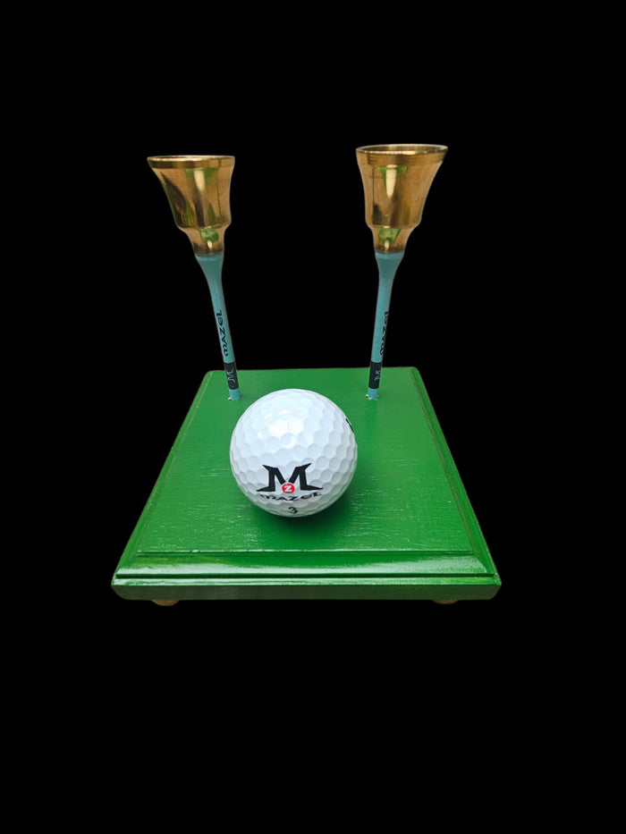 Golf Shabbat candlestick — green base with wooden tees, a golf ball and brass candle cups | Judaica Square Lakewood