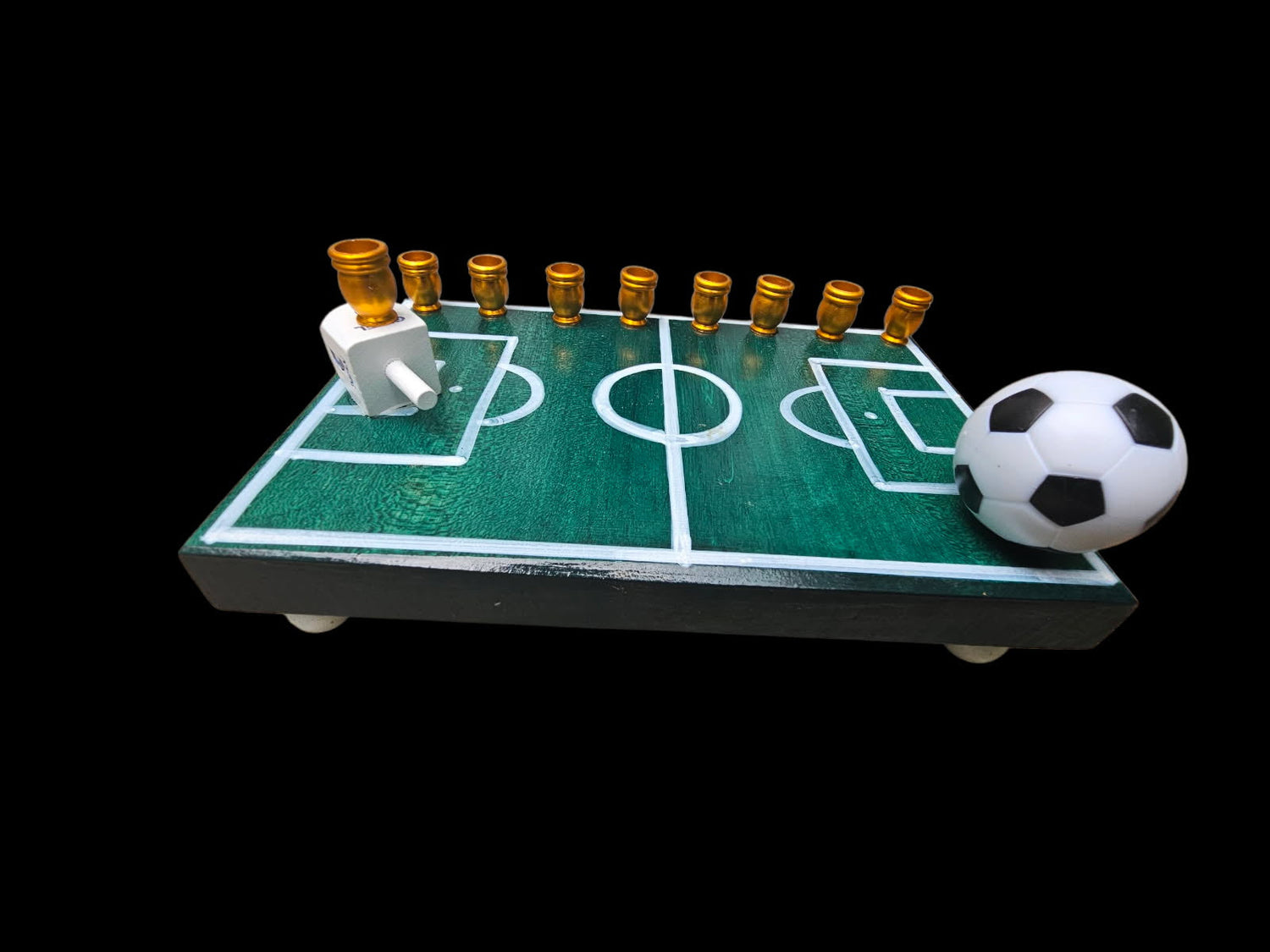Soccer Menorah — repurposed player figure with wood dreidel and aluminum cups | Judaica Square Lakewood (view 4)