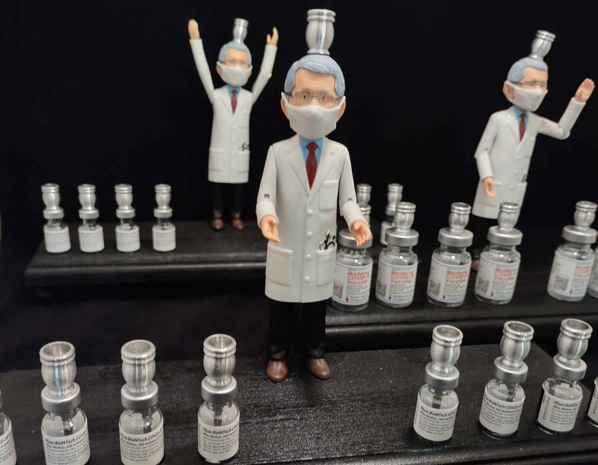Dr. Fauci Vaccine Menorah — action figure beside repurposed glass vaccine vials | Judaica Square Lakewood (view 7)