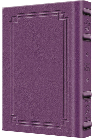 The pocket Schottenstein Interlinear Tehillim in purple Signature Leather, 4 by 6 inches, 504 pages.